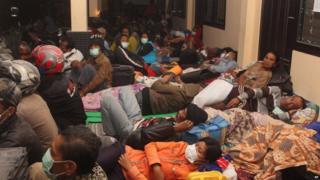 Evacuees in a room