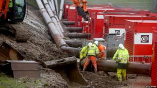 Engineers install pumps