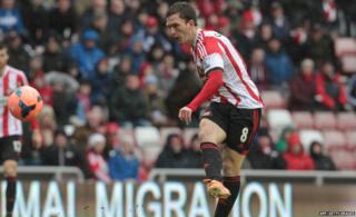 Craig Gardner scores