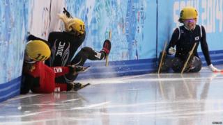 China's Li Jianrou, America's Emily Scott and South Korea's Kim Alang crash