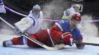 Russian forward Alexei Tereshchenko falls on ice