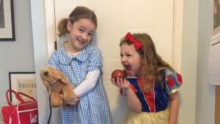 Eve is 7 and she's dressed up as Dorothy from The Wizard of Oz, while Elena, who's 5 dressed up as Snow White.