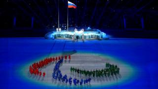 Dancers and the Paralympic flag