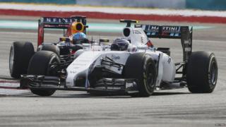 Williams Formula One driver Valtteri Bottas of Finland drives ahead of Red Bull Formula One driver Sebastian Vettel.
