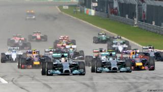 Williams Formula One driver Valtteri Bottas of Finland drives ahead of Red Bull Formula One driver Sebastian Vettel of Germany during the Malaysian F1 Grand Prix.