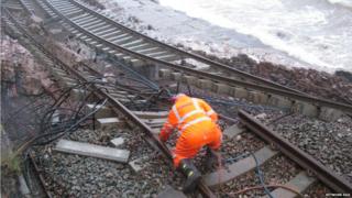 Engineer working on getting the rail line fixed