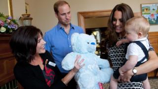 Prince George with his parents the Duke and Duchess of Cambridge