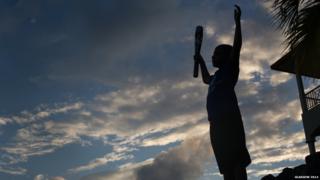 Child stood in shadow