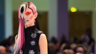 Woman with pink hair