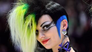 Woman with green and blue hair