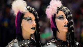 Twins with black and white hair