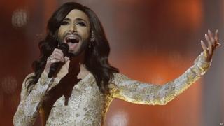 Singer Conchita Wurst, representing Austria, performs the song Rise Like a Phoenix.