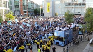 Manchester City team on open top bus parade