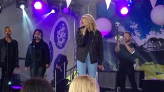 Pop singer Pixie Lott performing on stage