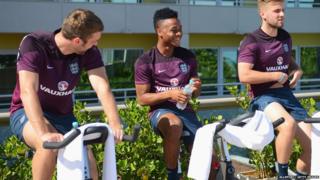 England players on exercise bikes