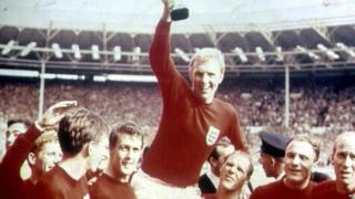 Bobby Moore, England Captain raises the World Cup trophy