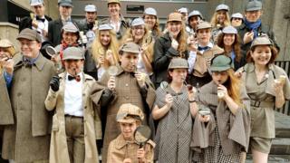 People dressed as Sherlock Holmes character