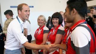 Prince William chats to staff