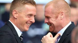 Swansea City manager Gary Monk (left) and Burnley manager Sean Dyche prior to kick off of the Barclays Premier League match at the Liberty Stadium