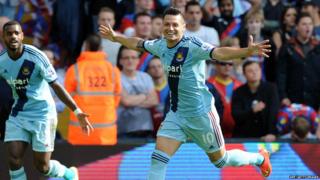 West Ham United's Argentinian striker Mauro Zarate celebrates scoring the opening goal during the English Premier League football match between Crystal Palace and West Ham United at Selhurst Park in south London