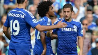 Chelsea's Eden Hazard (R) celebrates scoring a goal during their English Premier League soccer match between Chelsea and Leicester City at Stamford Bridge