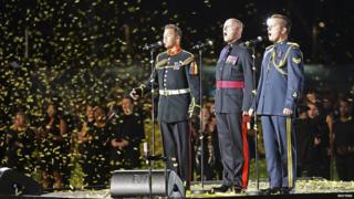 Members of the Tri-Service Male Singers, Urban Voices Choir and 3 X-Service Bands perform the Invictus Anthem during the Opening Ceremony of the Invictus Games