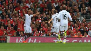Gabriel Agbonlahor celebrates scoring against Liverpool