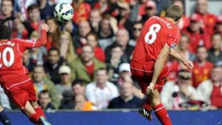 Steven Gerrard scores a free kick against Everton