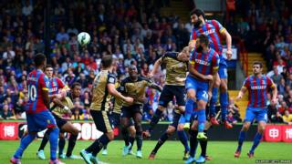 Mile Jedinak scores with header against Leicester