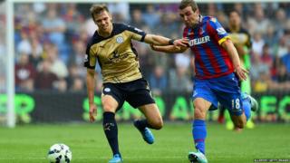Dean Hammond of Leicester City battles for the ball with James McArthur of Crystal Palace during the Barclays Premier League match between Crystal Palace and Leicester City at Selhurst Park