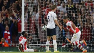 Alex Oxlade-Chamberlain ensured honours were even as Arsenal and Tottenham fought out an entertaining north London derby at Emirates.