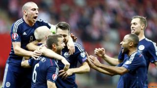 Scotland's players celebrate.