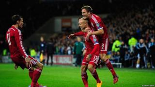 Wales celebrating their win.