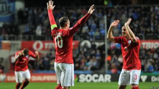 England celebrate their win.