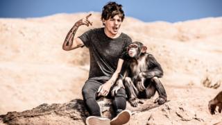 Louis sings songs with a chimp