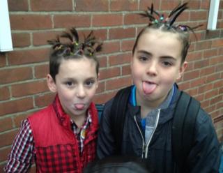 Boys with loom bands in their hair