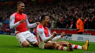 Alexis Sanchez (right) celebrates with Kieran Gibbs