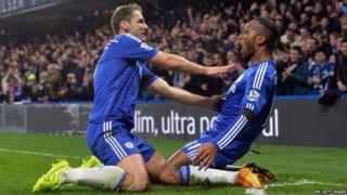 Chelsea's Didier Drogba (right) celebrates Branislav Ivanovic
