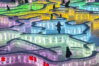 Visitors walks in an ice maze