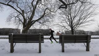 Imagine going running in this! The National Weather Service has warned of "dangerously cold air" across the US - and that people need to wrap up warm to protect against frostbite.