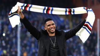 Samuel Eto'o salutes Sampdoria supporters at the end of a Serie A soccer match between Sampdoria and Palermo, in Genoa, Italy, Sunday, Jan. 25, 2015