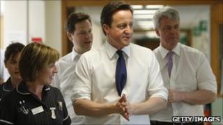 David Cameron, Nick Clegg and Andrew Lansley visiting a hospital