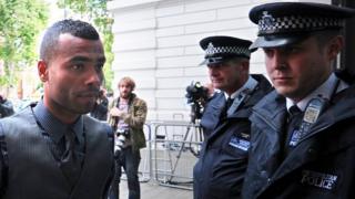 Ashley Cole arrives to attend the trial of his team-mate John Terry