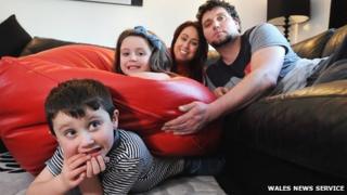 The Lorey family with the giant bean bag