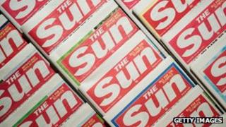 Copies of the Sun newspaper