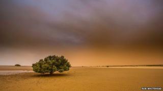 Stormy skies loom over Pretty Pool in Port Hedland as Cyclone Christine approaches West Australia's Pilbara coast, 30 December 2013