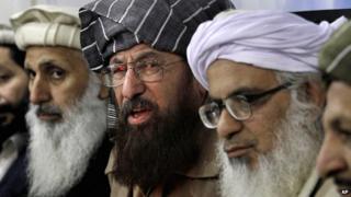 Three leading Pakistani clerics and members of a committee nominated by the Taliban to conduct talks with the government - Ibrahim Khan, Maulana Sami-ul-Haq, and Maulana Abdul Aziz - give a news conference in Islamabad, Pakistan, on 3 February 2014