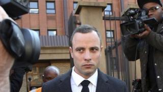 Oscar Pistorius leaves the high court in Pretoria, South Africa, on 20 May 2014.