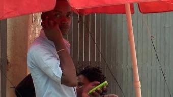 A man on a mobile phone in Malawi