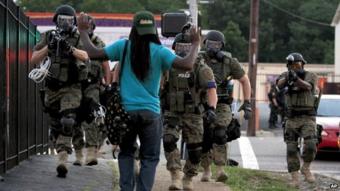 Protester faces police in Ferguson